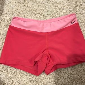 These are Nike dry, fit athletic shorts, the color shade pink